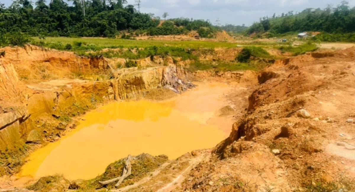 Bottled Water Governance Ghana meets galamsey reality — a river scarred by silt and mercury.