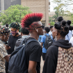 Breaking: Universities Discover the Real Cause of Poor Grades University Hairstyles Debate showing students with colourful hairstyles and earrings on a Ghanaian university campus.